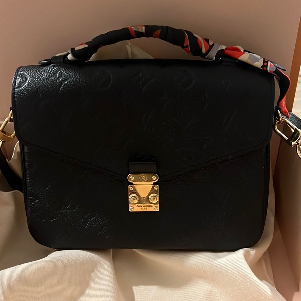 Excellent condition. Will come with a bandeau that I bought it with.
